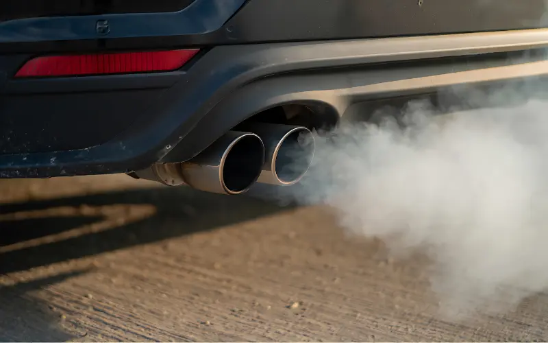 White smoke from car exhaust.