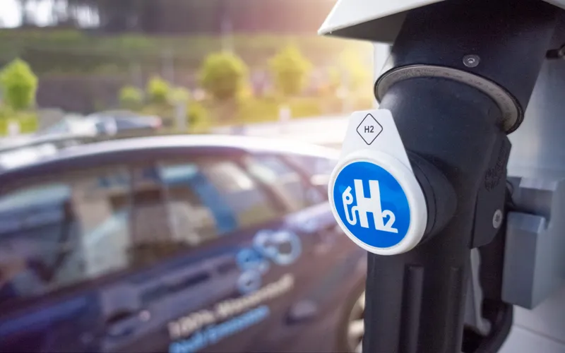 Car parked up at hydrogen fuel station.