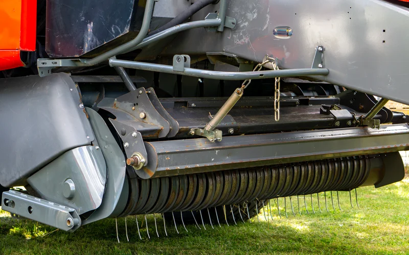 Close up of baler mechanics.