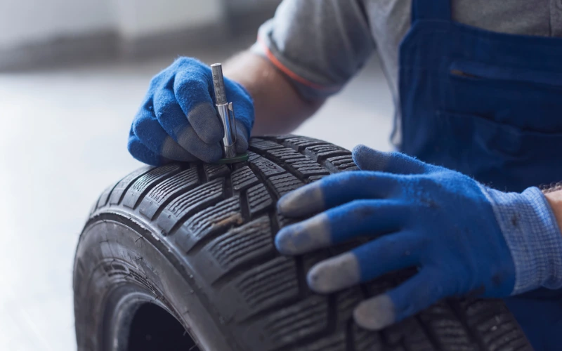 Checking tread depth on a motorbike