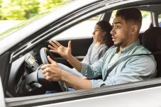 two people in a car 