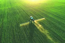 tractor in a large field