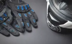 Motorcycle gloves and helmet thumbnail image
