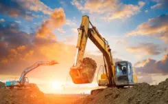 Excavators in operation on a construction site thumbnail