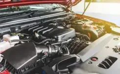 Close up of car engine with bonnet up